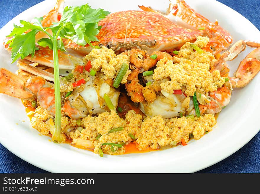 Stir-Fried crab with Curry Powder, Pepper, and Eggs. Stir-Fried crab with Curry Powder, Pepper, and Eggs.