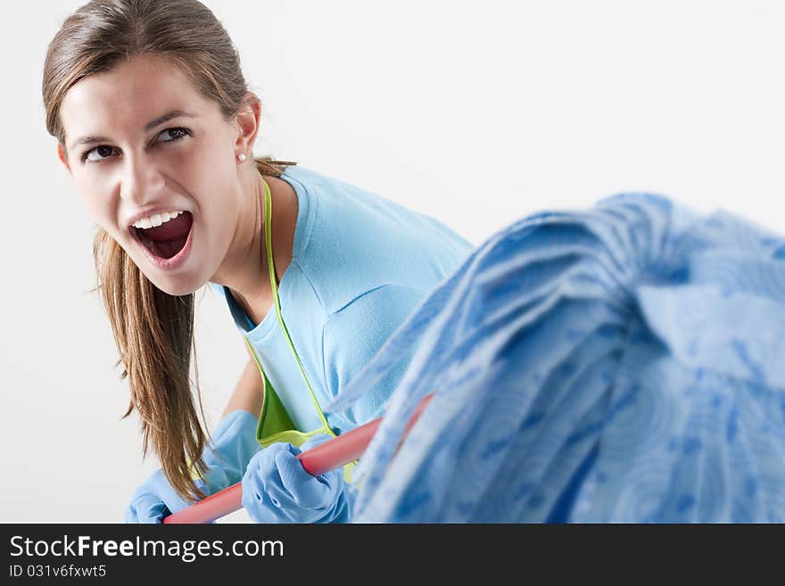 Crazy Housewife Fighting With Mop, copy-space