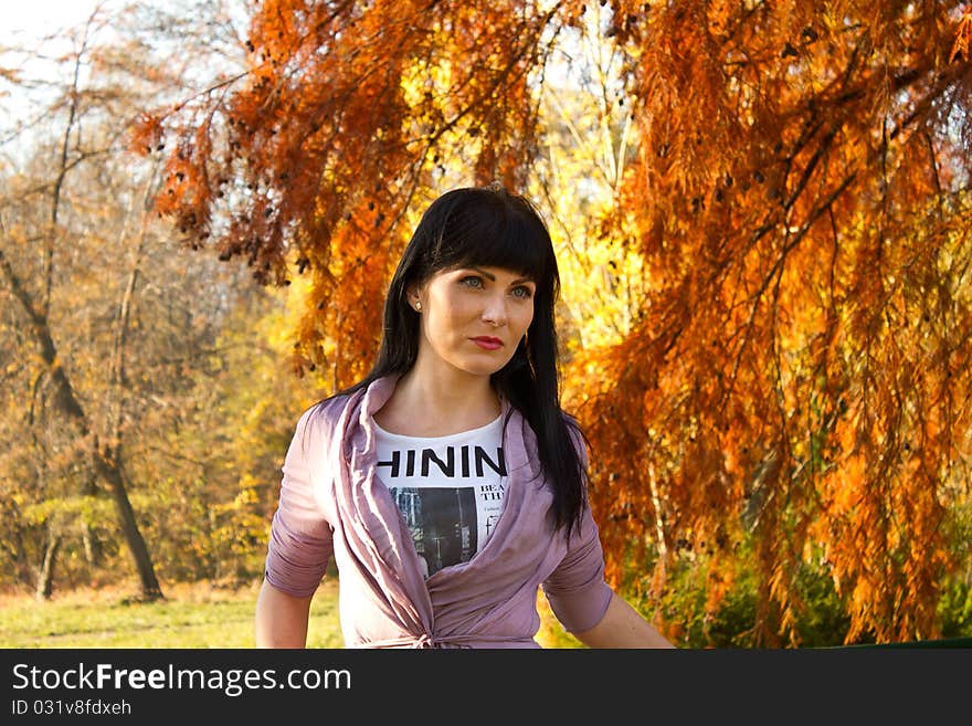 Woman's portrait in the park on a sunny day