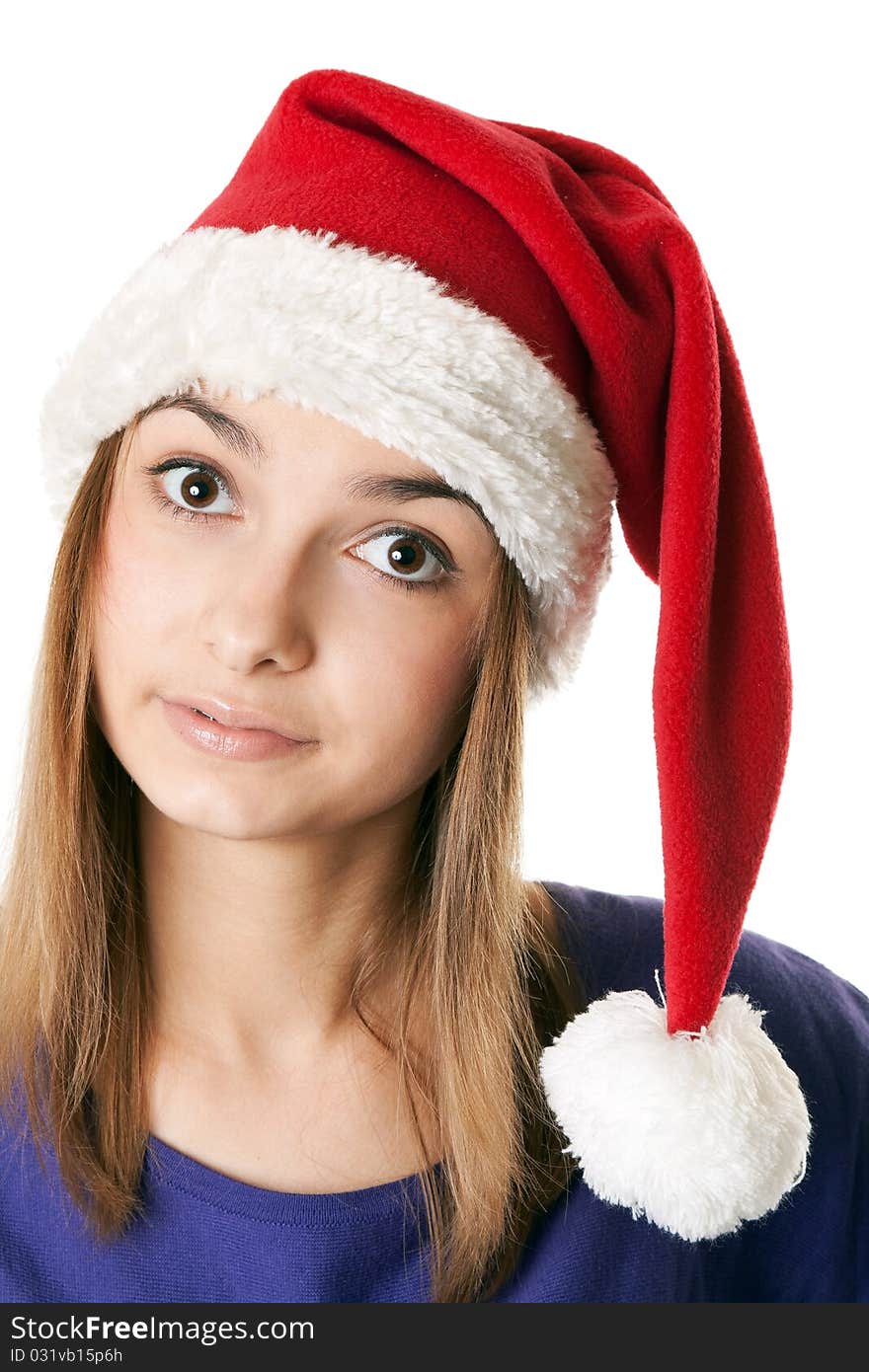 Beautiful girl in red Santa hat on a white background