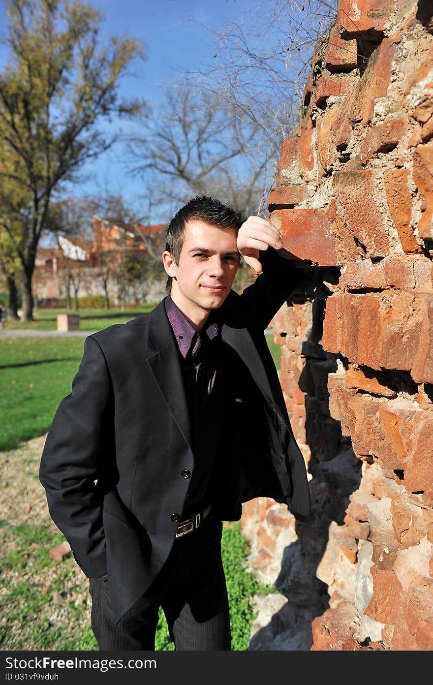 Portrait of an happy young attractive man in the park. Portrait of an happy young attractive man in the park