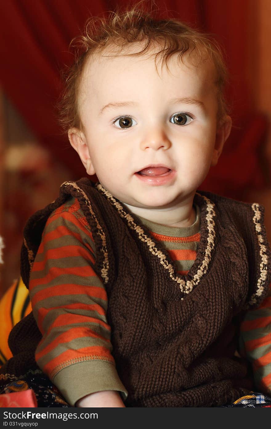 Portrait of a baby with a pacifier in his mouth. Portrait of a baby with a pacifier in his mouth