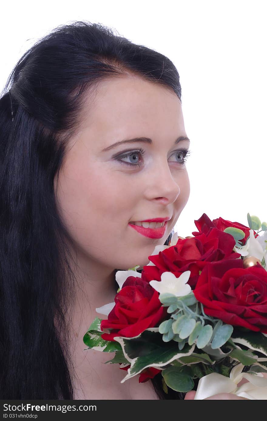 Photograph of beautiful young female with flowers isolated