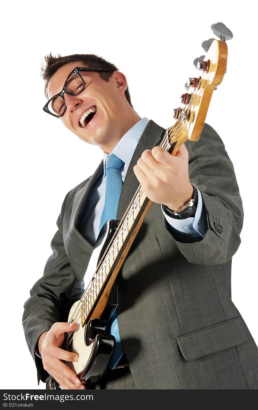 Young businessman with guitar. Isolated on white