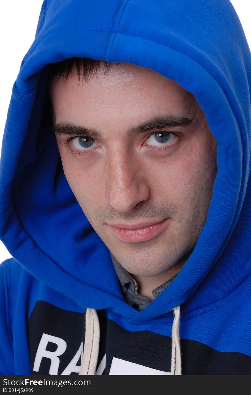 Photograph showing male in blue hooded top isolated against white