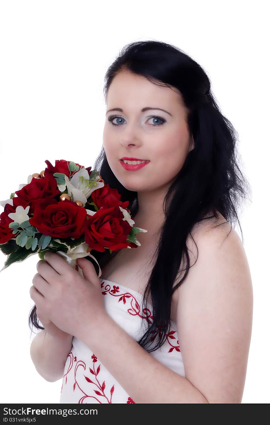 Photograph showing cute young bride in white and red wedding dress isolated against white