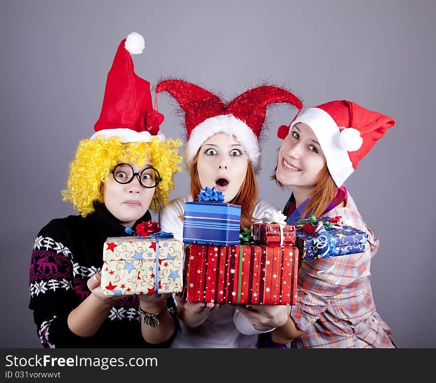 Three girlfriends in funny hats