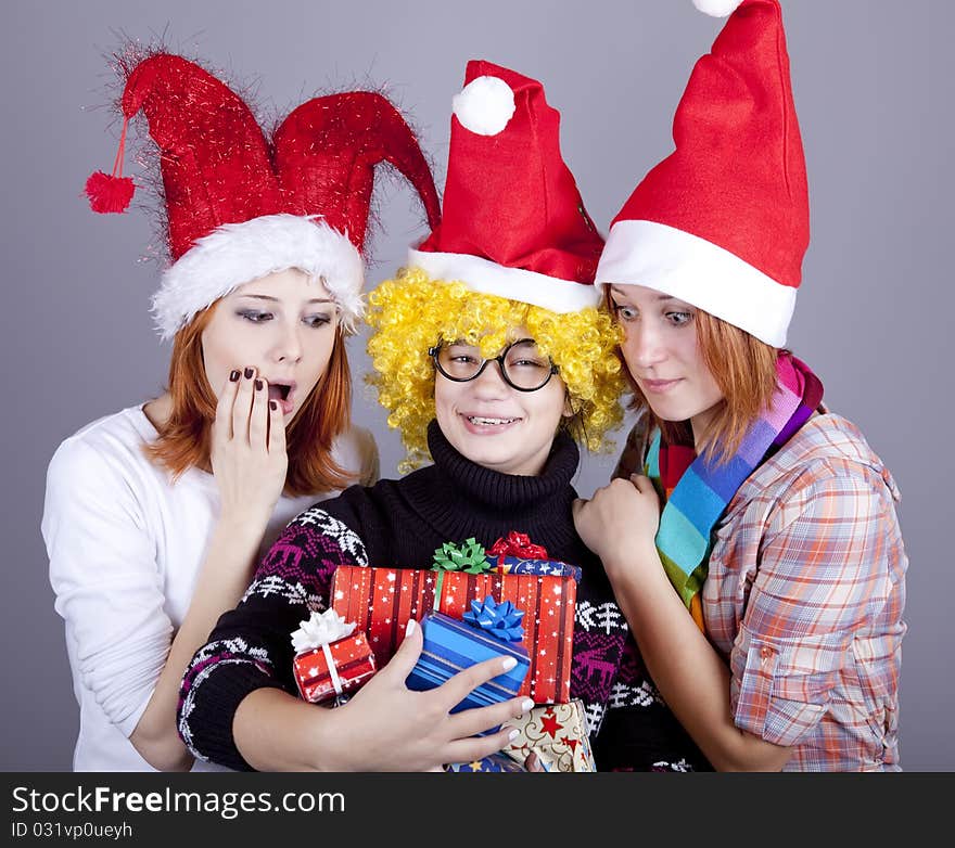 Three girlfriends in funny hats