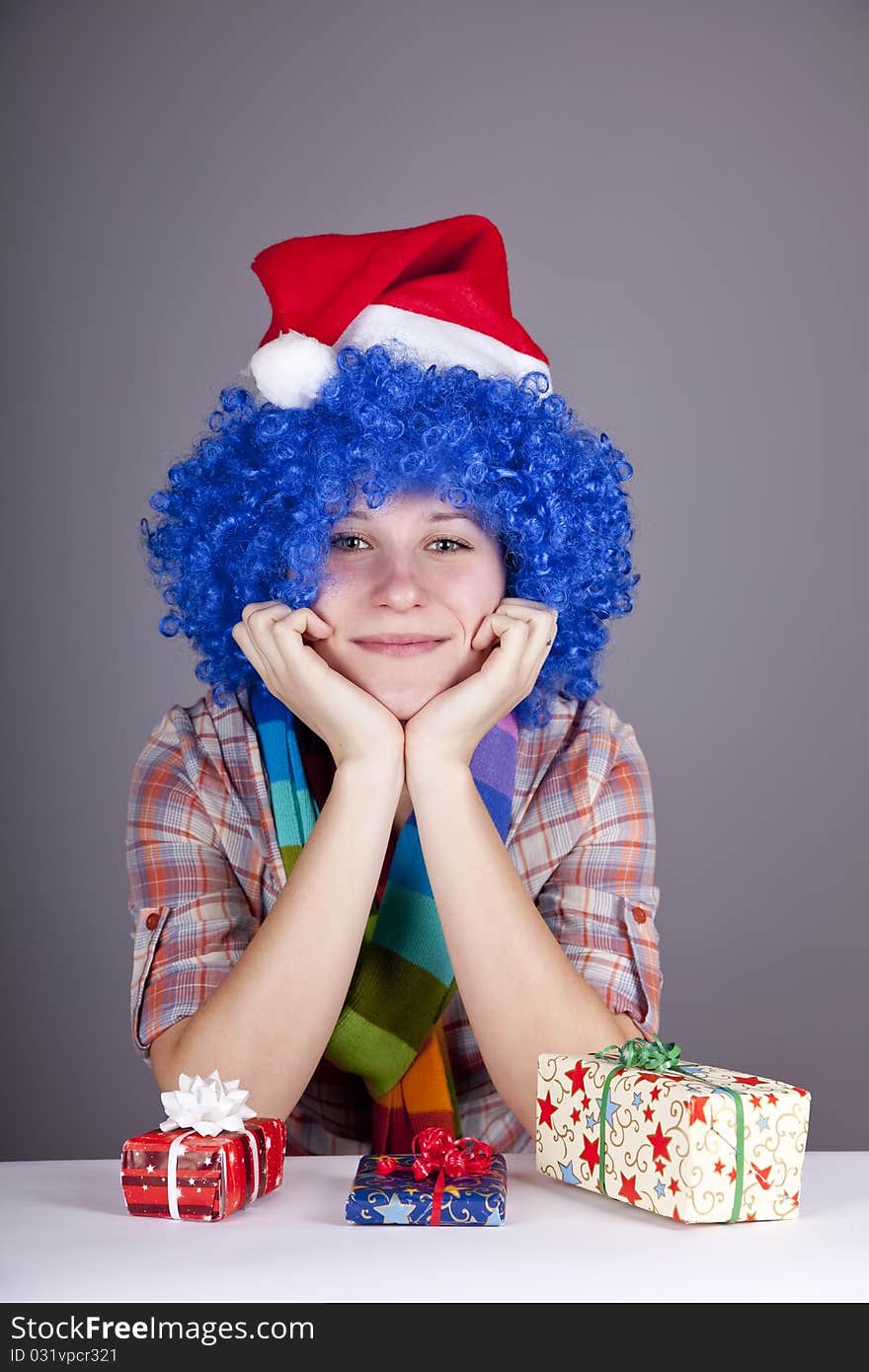 Funny girl with christmas gift.