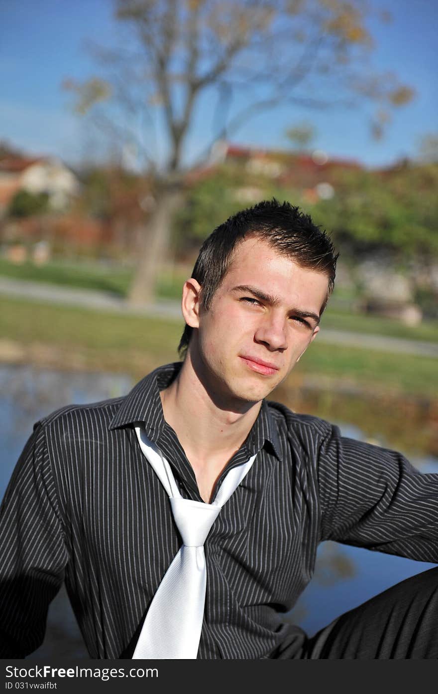 Portrait of an attractive man in the park. Portrait of an attractive man in the park