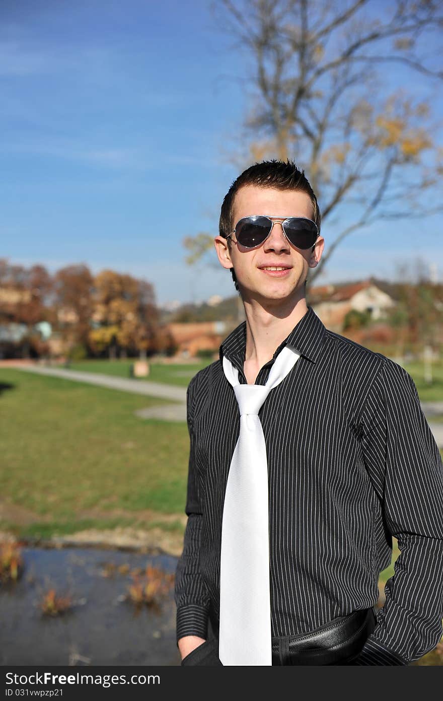 Portrait of an attractive man in the park. Portrait of an attractive man in the park