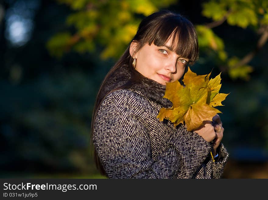 Fashion Model Posing in the park. Fashion Model Posing in the park