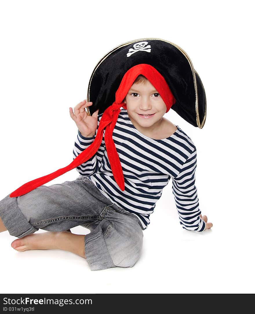 Studio portrait of young boy dressed as pirate