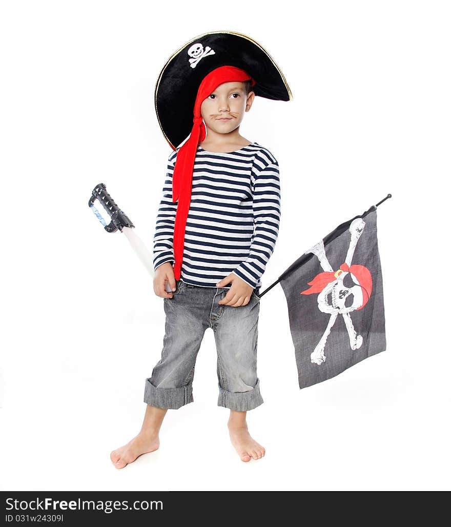 Studio portrait of young boy dressed as pirate