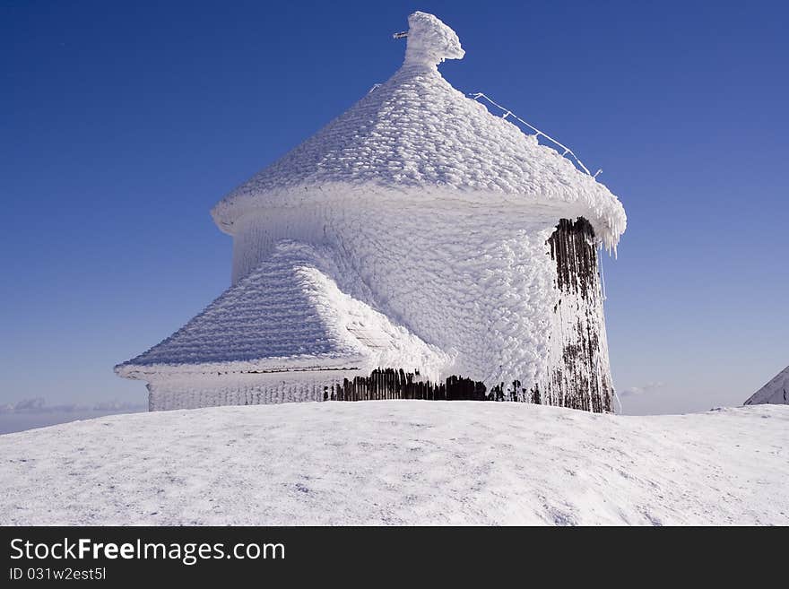 Small chapel on a summit during blizzard. Small chapel on a summit during blizzard