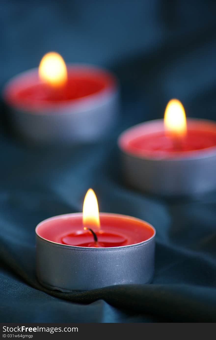 Still life with candles and textile