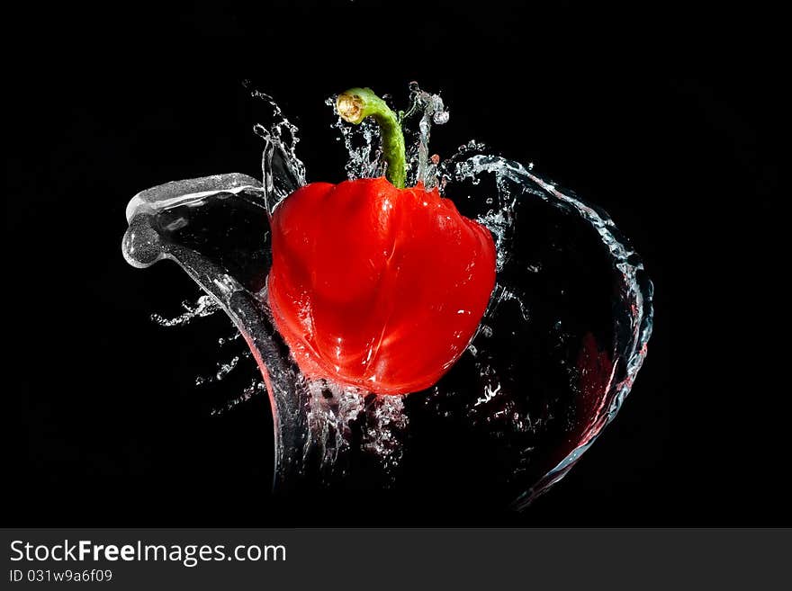 Red pepper splash in water. Red pepper splash in water