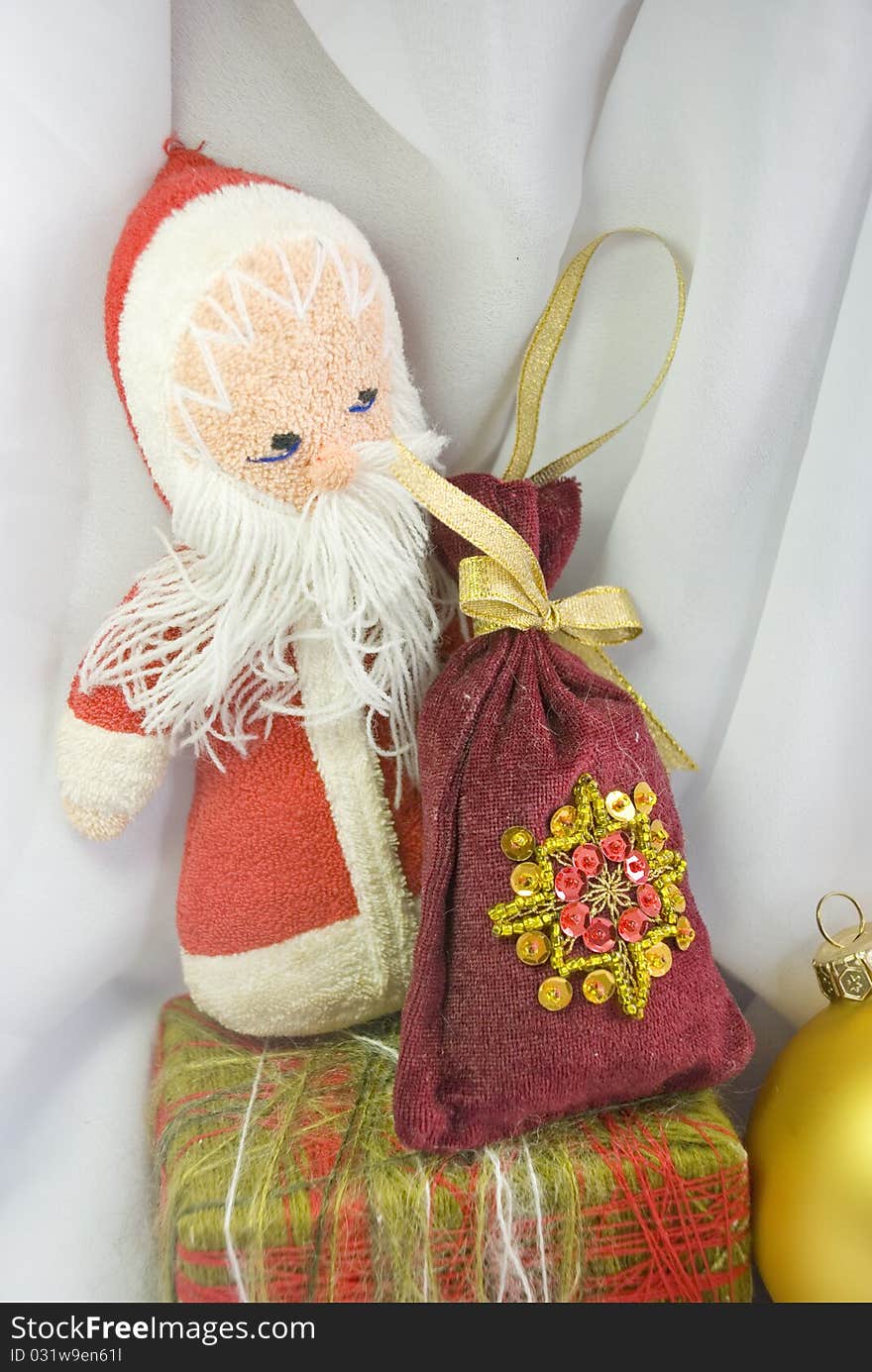 Old toy - Santa Claus with a bag of gifts