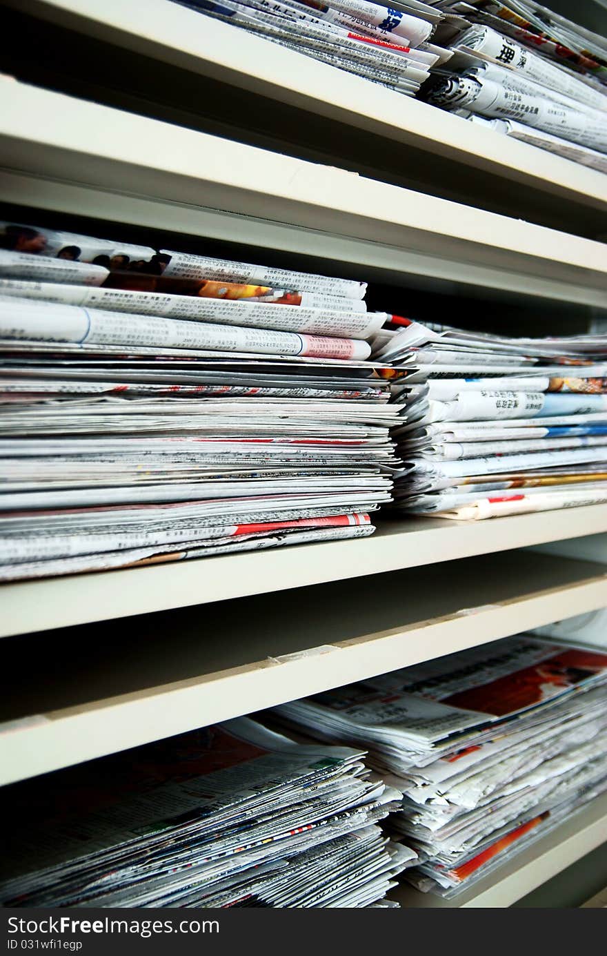 Stack of newspaer on the shelf. Stack of newspaer on the shelf