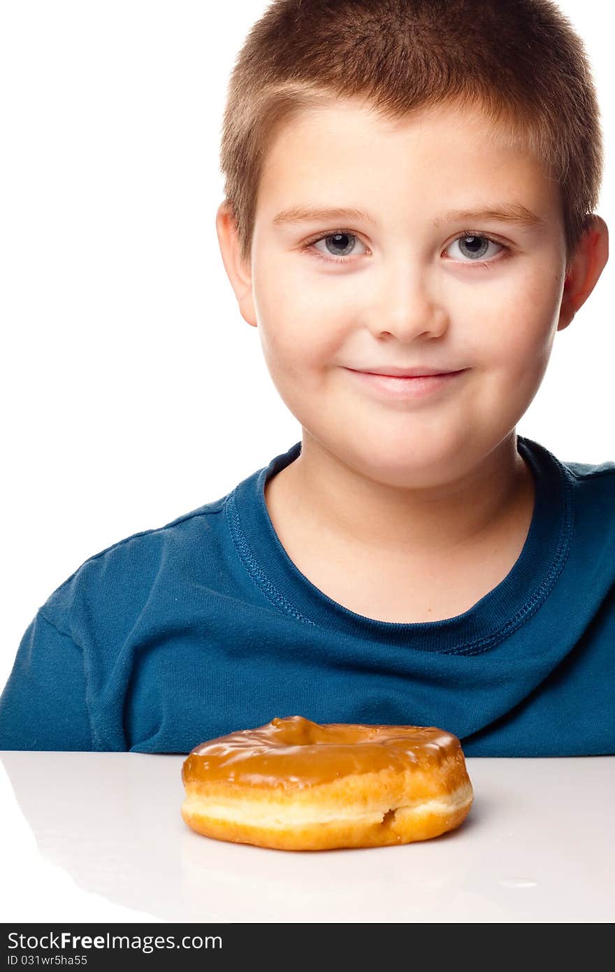 Boy about to eat a donut. Boy about to eat a donut