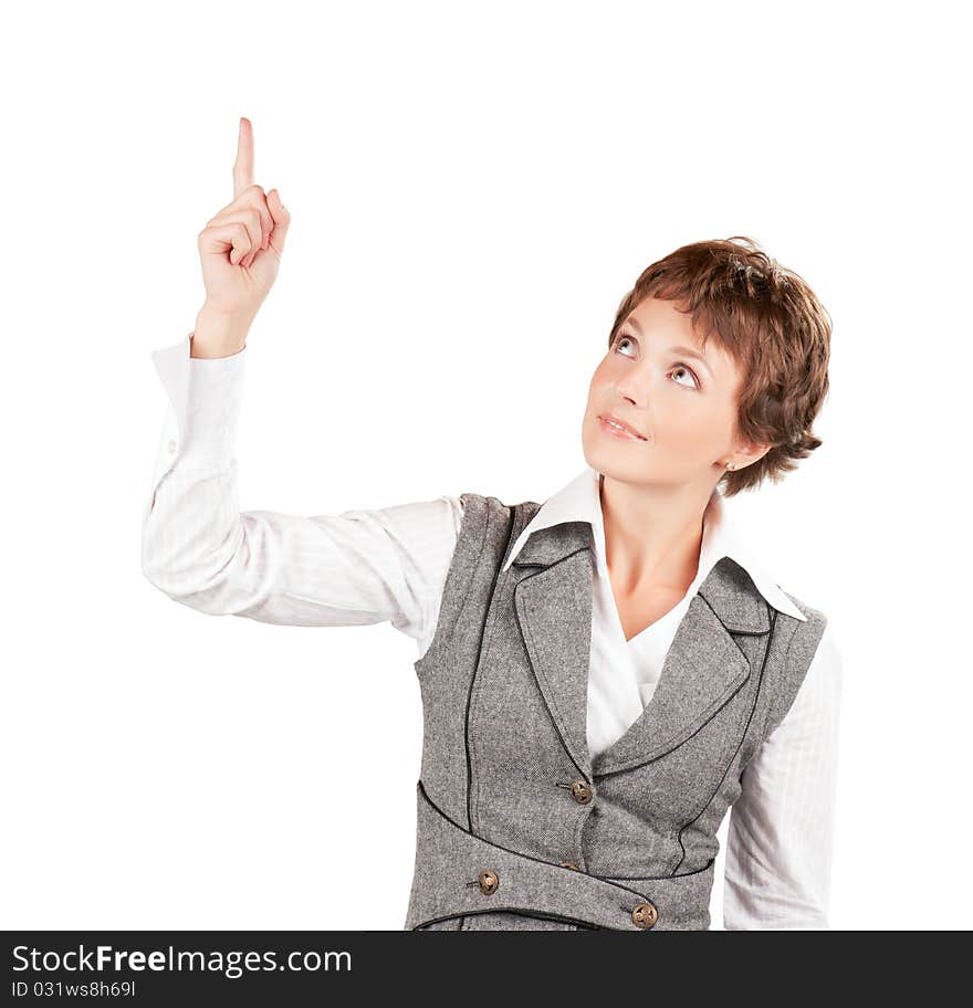 Beautiful businesswoman looking and pointing at copyspace, isolated on white background