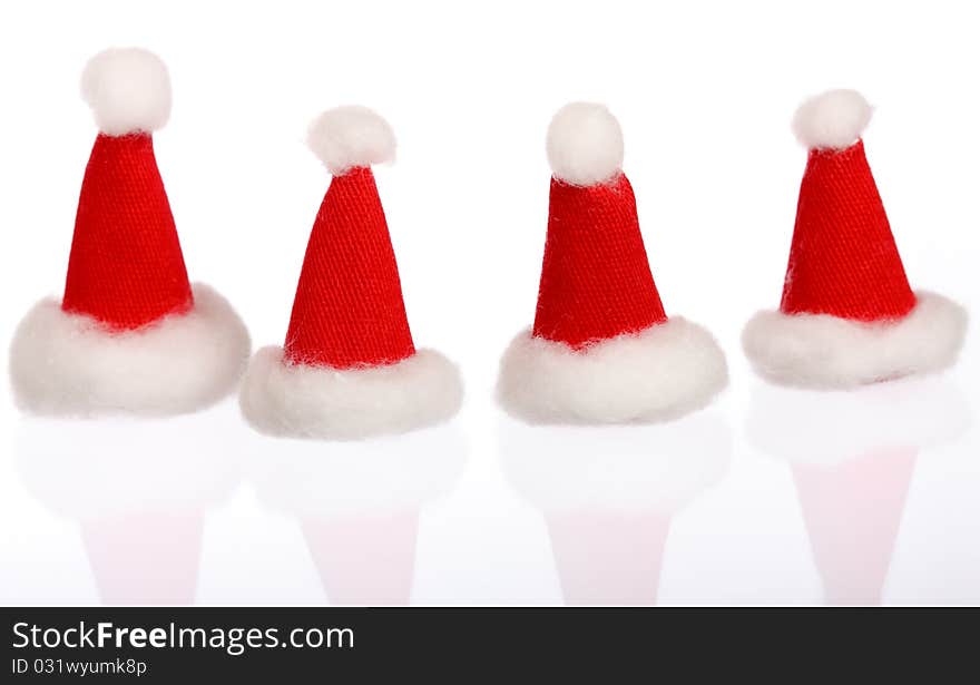 New Year: four small Santas caps