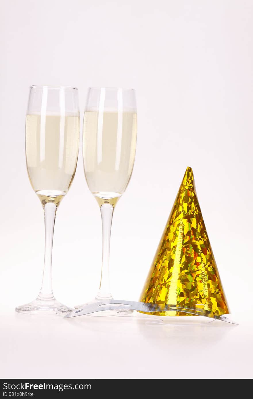 Champagne and party time on white background