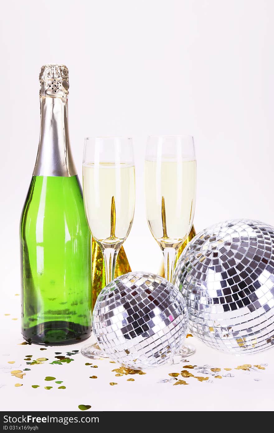 Champagne and party time on white background