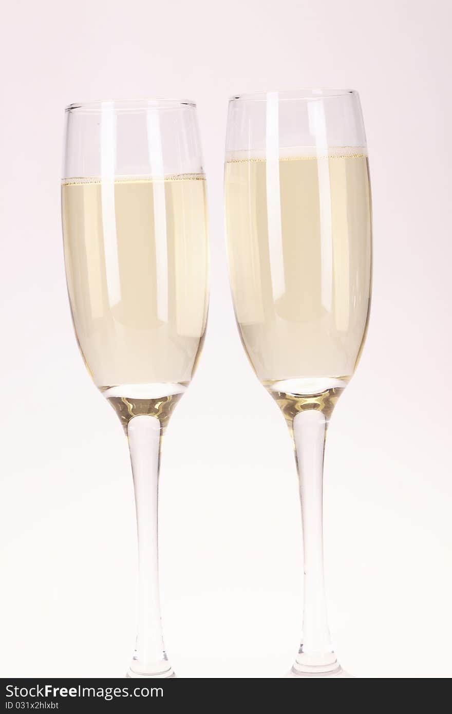 Champagne and party time on white background