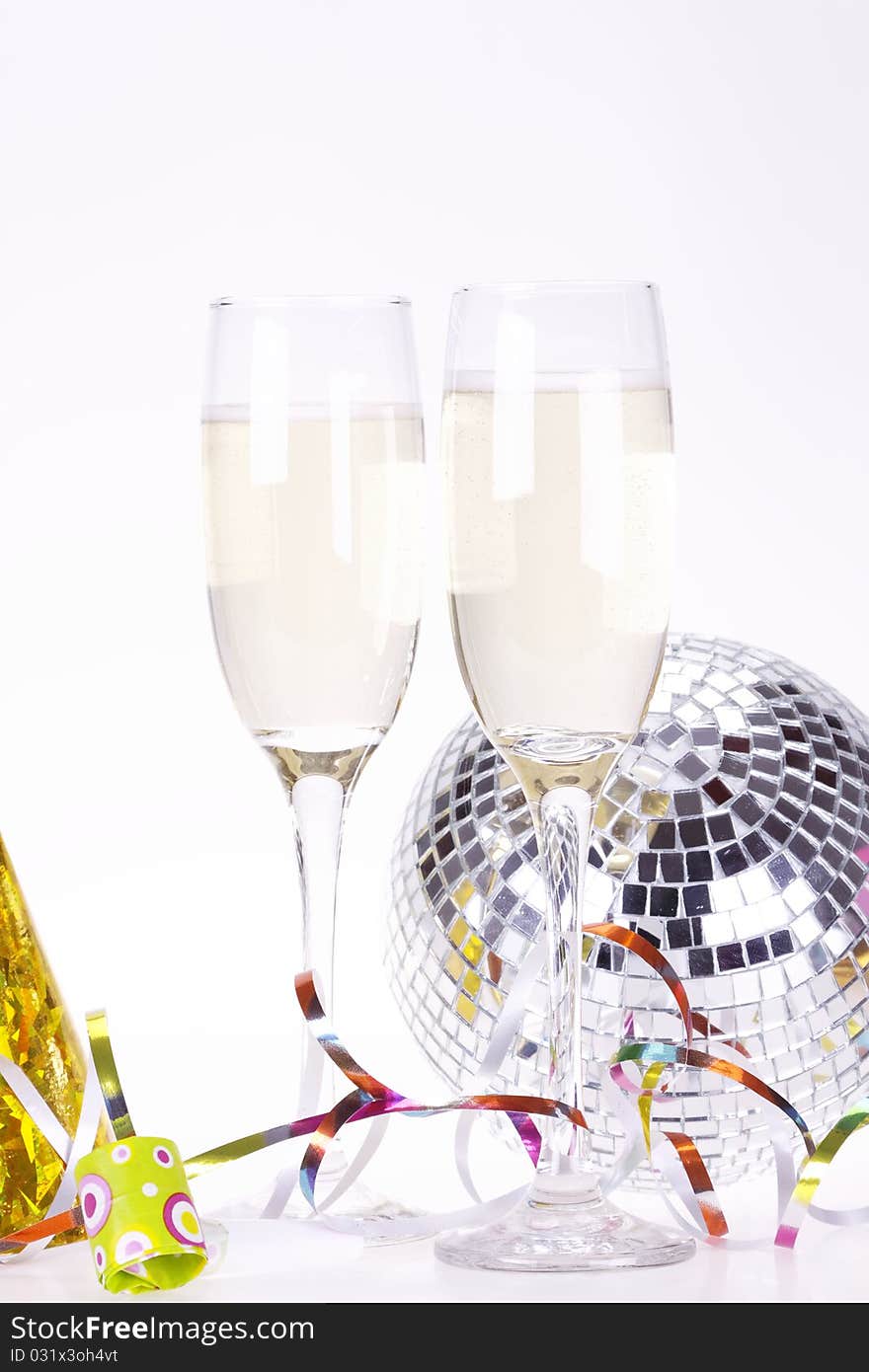 Champagne and party time on white background