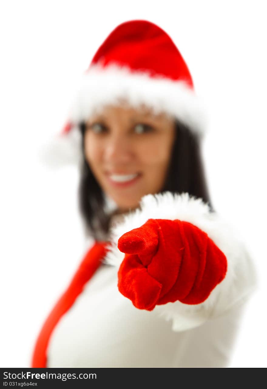 young Christmas woman in red gloves is pointing to us. young Christmas woman in red gloves is pointing to us