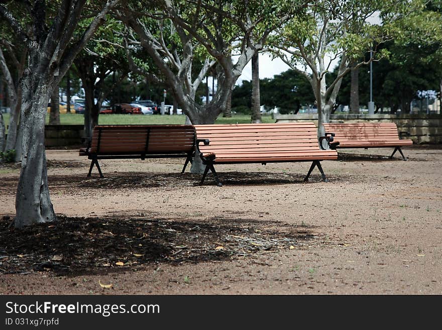 Three park bench seats in outdoors park