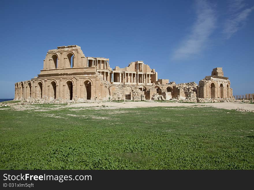 Built between 175-200AD during the Severan reconstruction of the city. Sabratha theatre is situated on the outskirts of the city, beyond the byzantine walls. It was built in the second century AD and survives to this day owing to its reconstruction by Italian archaeologists in the 20th century. Its seating and stage are relatively intact, as are its backstage rooms, making it the most complete. Built between 175-200AD during the Severan reconstruction of the city. Sabratha theatre is situated on the outskirts of the city, beyond the byzantine walls. It was built in the second century AD and survives to this day owing to its reconstruction by Italian archaeologists in the 20th century. Its seating and stage are relatively intact, as are its backstage rooms, making it the most complete