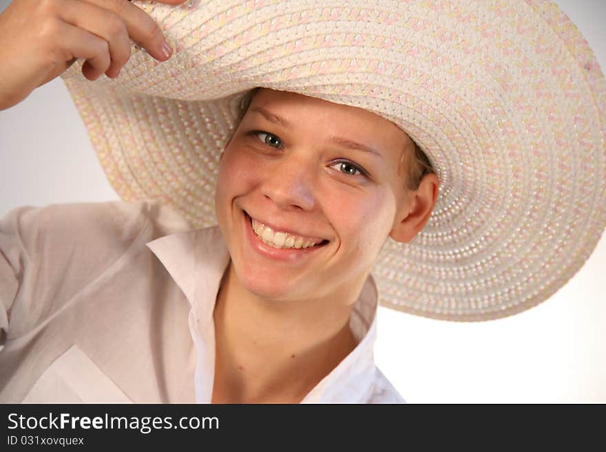 The beautiful sexual girl with long hair in a hat in a retro style.Eyes. The beautiful sexual girl with long hair in a hat in a retro style.Eyes.