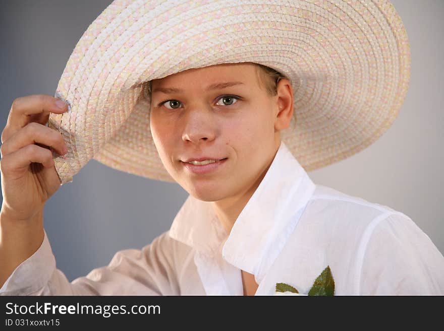 The beautiful sexual girl with long hair in a hat in a retro style.Eyes. The beautiful sexual girl with long hair in a hat in a retro style.Eyes.