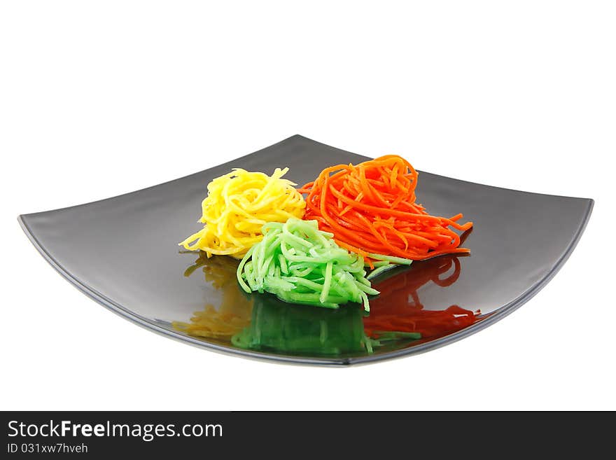 Grated vegetables on the plate