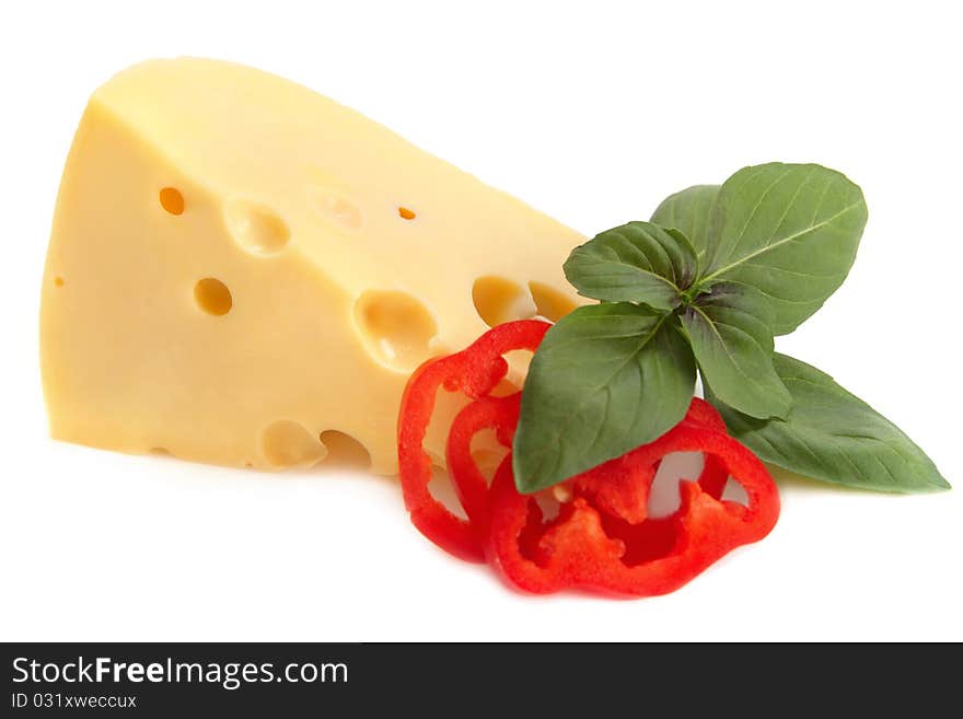 Delicious cheese, red pepper and basil on white background. Delicious cheese, red pepper and basil on white background