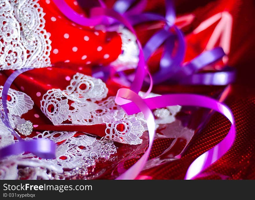 Red Christmas background with lace and serpentine