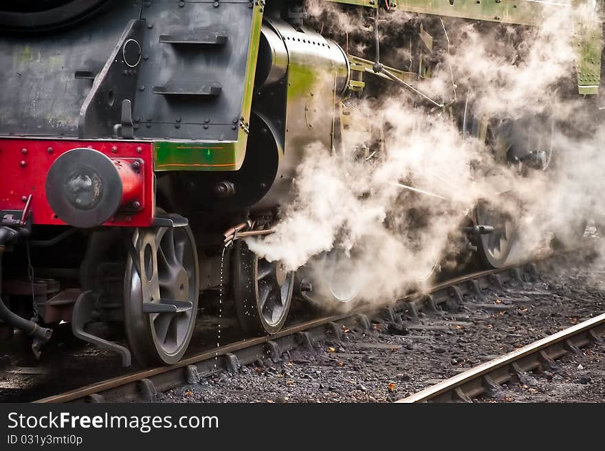 Steam release from a vintage locomotive. Steam release from a vintage locomotive