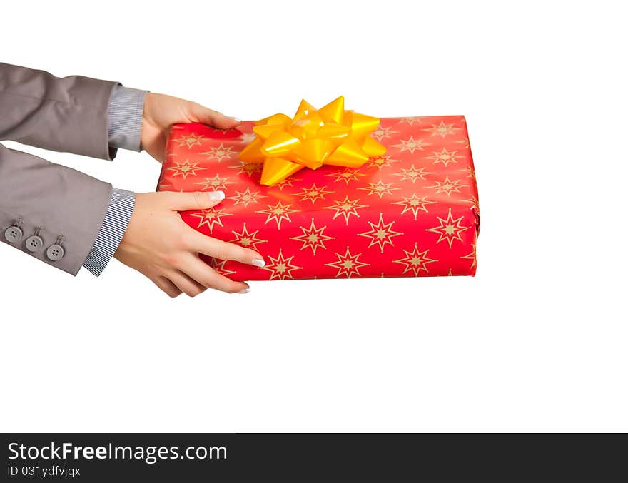 Woman hand holding christmas present on white background