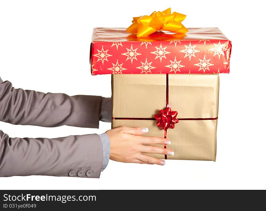 Woman hand holding christmas present on white background