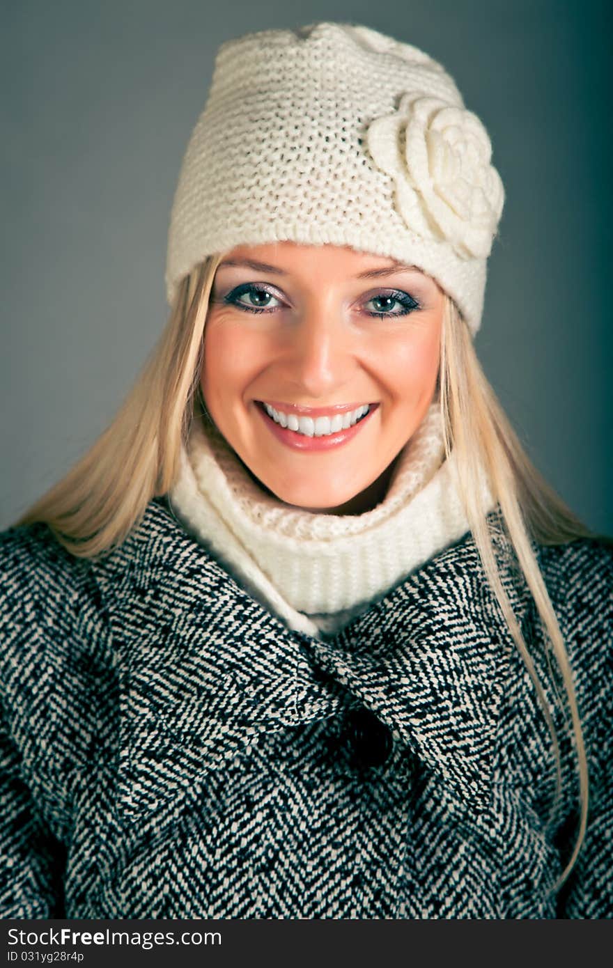 Portrait of blond woman in winter clothes