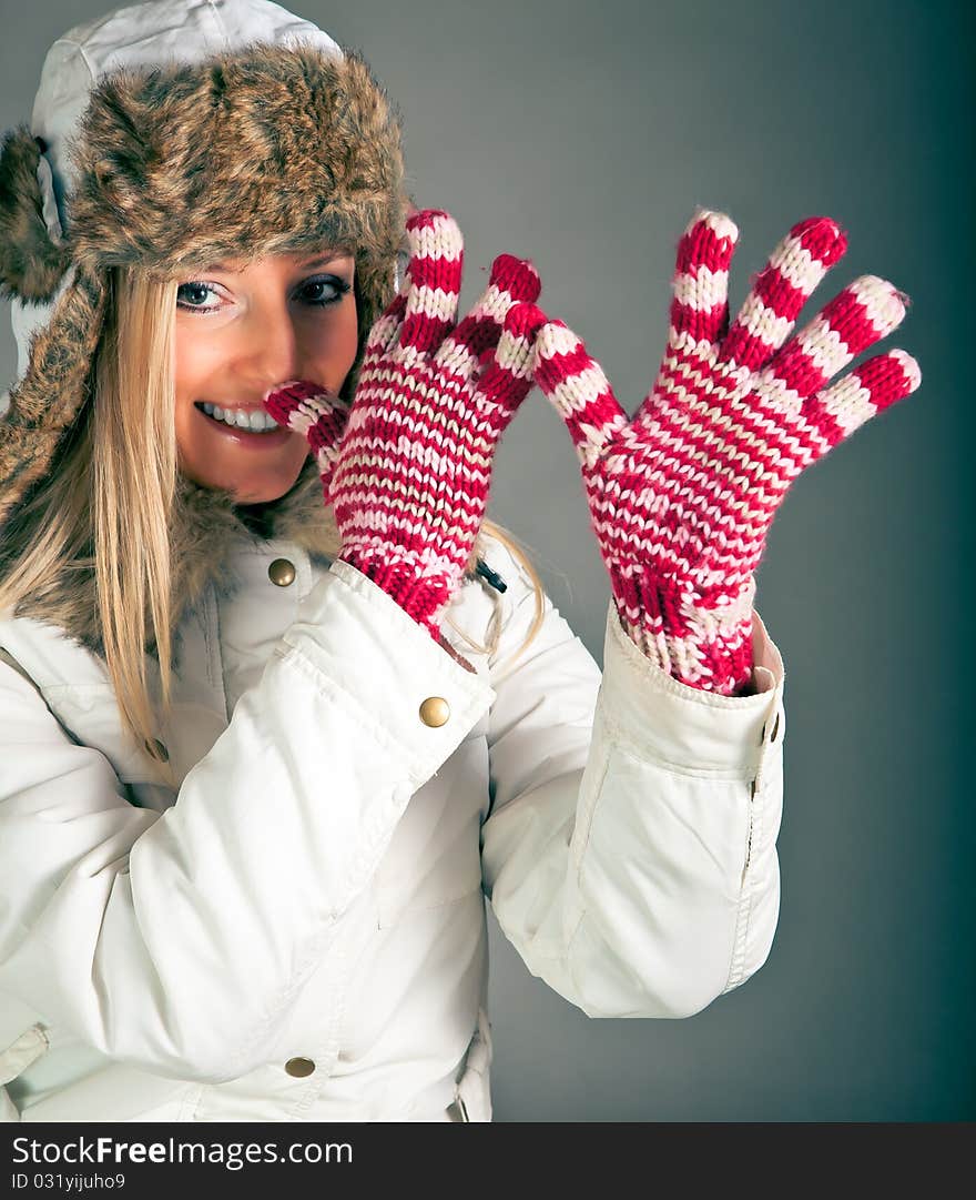 Portrait of blond woman in winter clothes