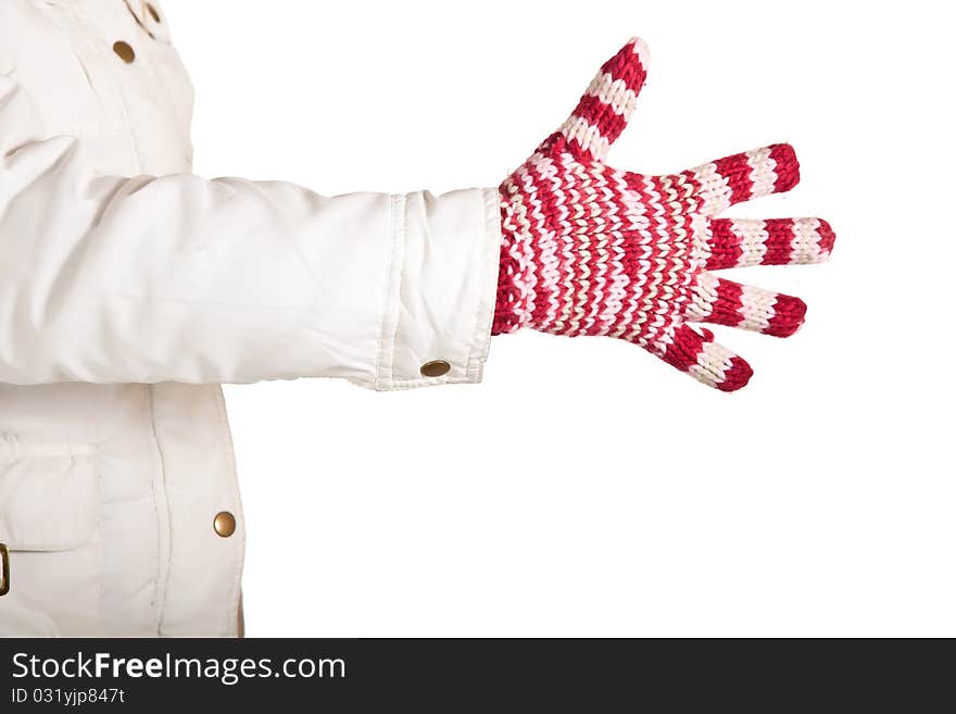 Woman hand in colorful and warm gloves isolated on white