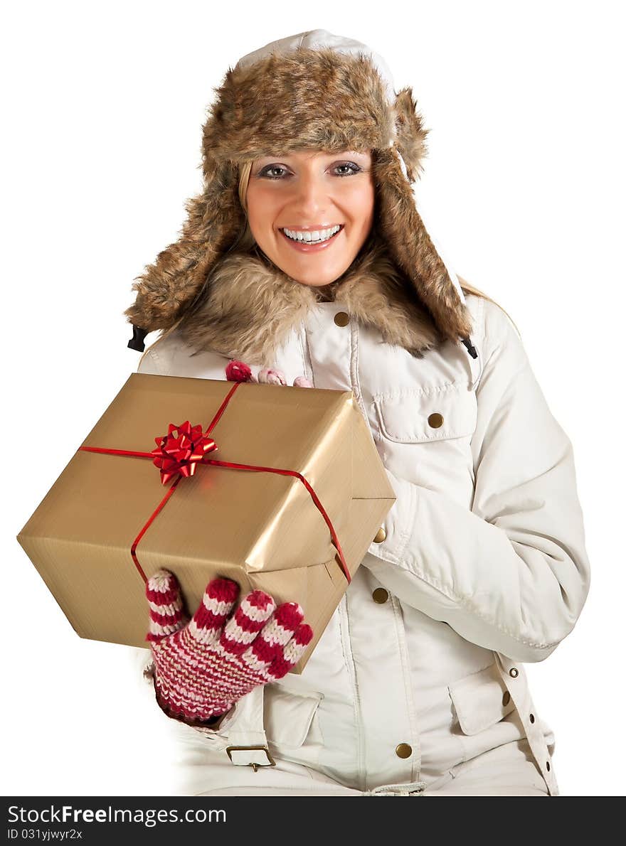 Caucasian blond woman in furry hat and christmas gifts isolated on white