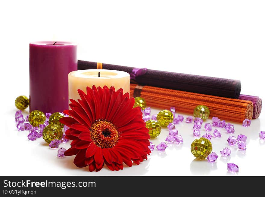 Beautiful spa background with 2 candles and flower. isolated on white background