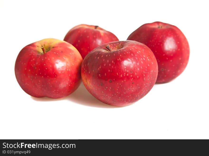 Fresh red juicy natural apples on white isolated background. Fresh red juicy natural apples on white isolated background