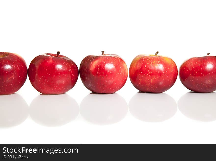 Fresh red juicy natural apples on white isolated background. Fresh red juicy natural apples on white isolated background