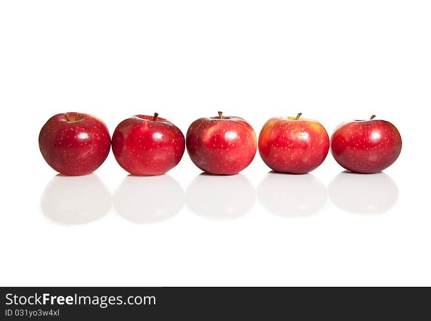 Fresh red juicy natural apples on white isolated background. Fresh red juicy natural apples on white isolated background