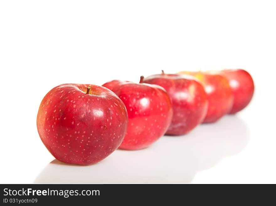 Fresh red juicy natural apples on white isolated background. Fresh red juicy natural apples on white isolated background